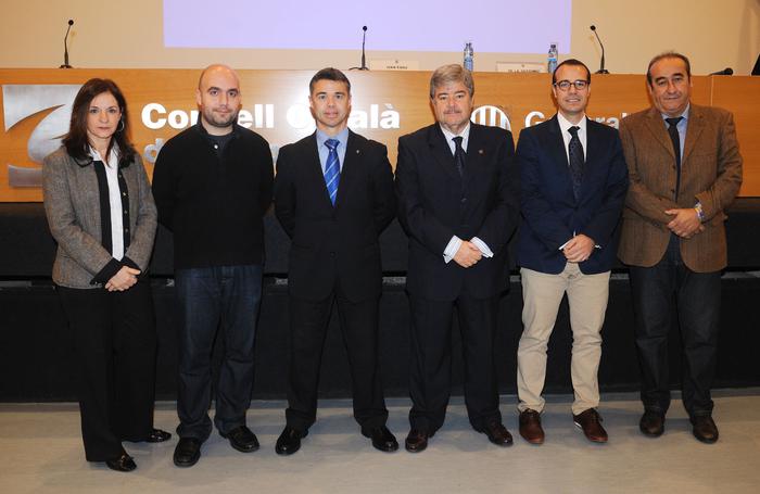 Fotografia del secretari general de l'Esport, amb els ponents de la jornada (Autor: Jordi Estruch)