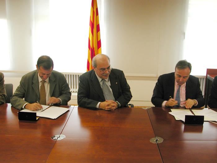 El conseller Mas-Colell amb Joan David Grimà i Miguel Angel Lagunas 